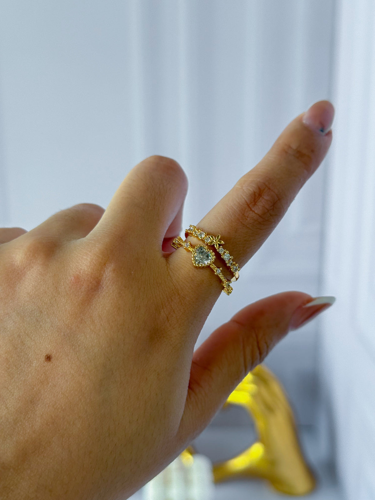 Doble anillo con corazón