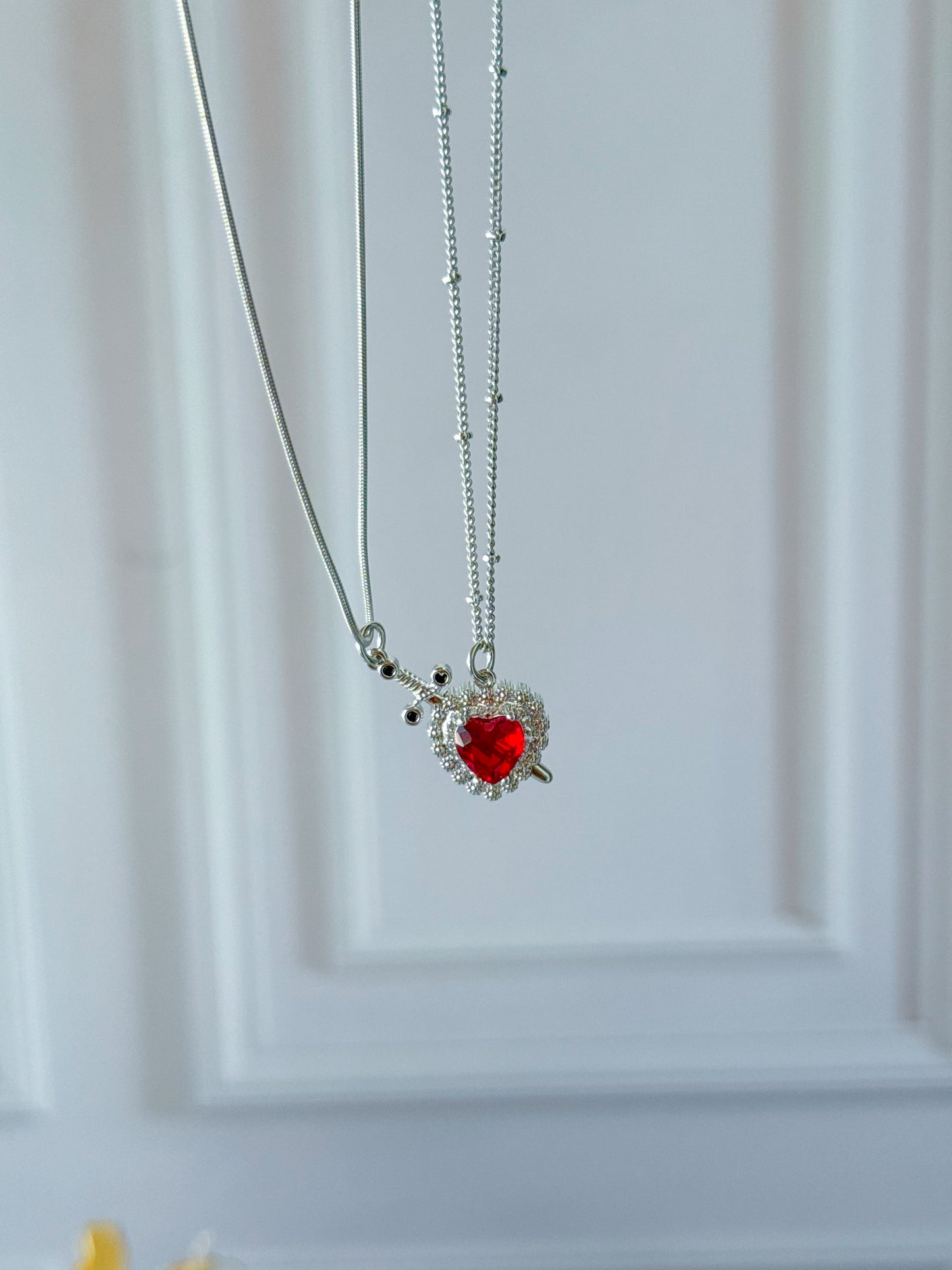 Dúo de cadenas para compartir corazón espada