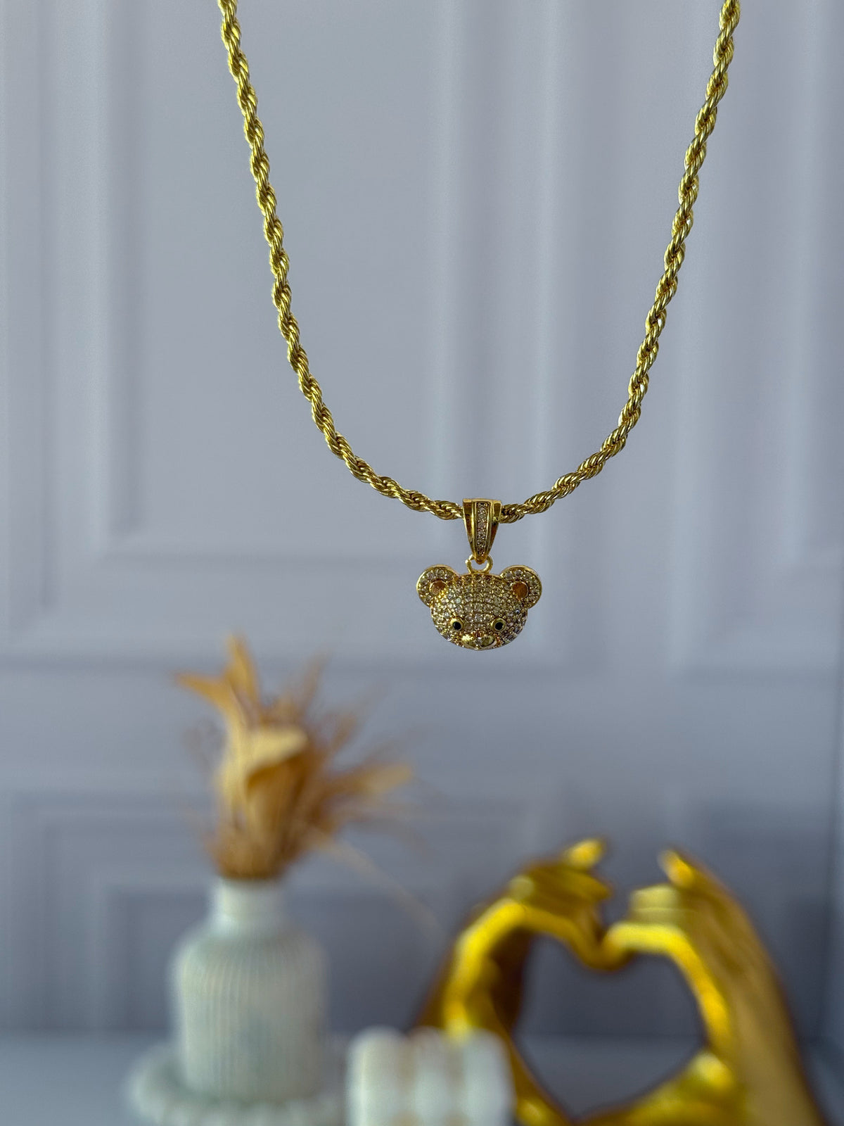 Chain bear face with bow