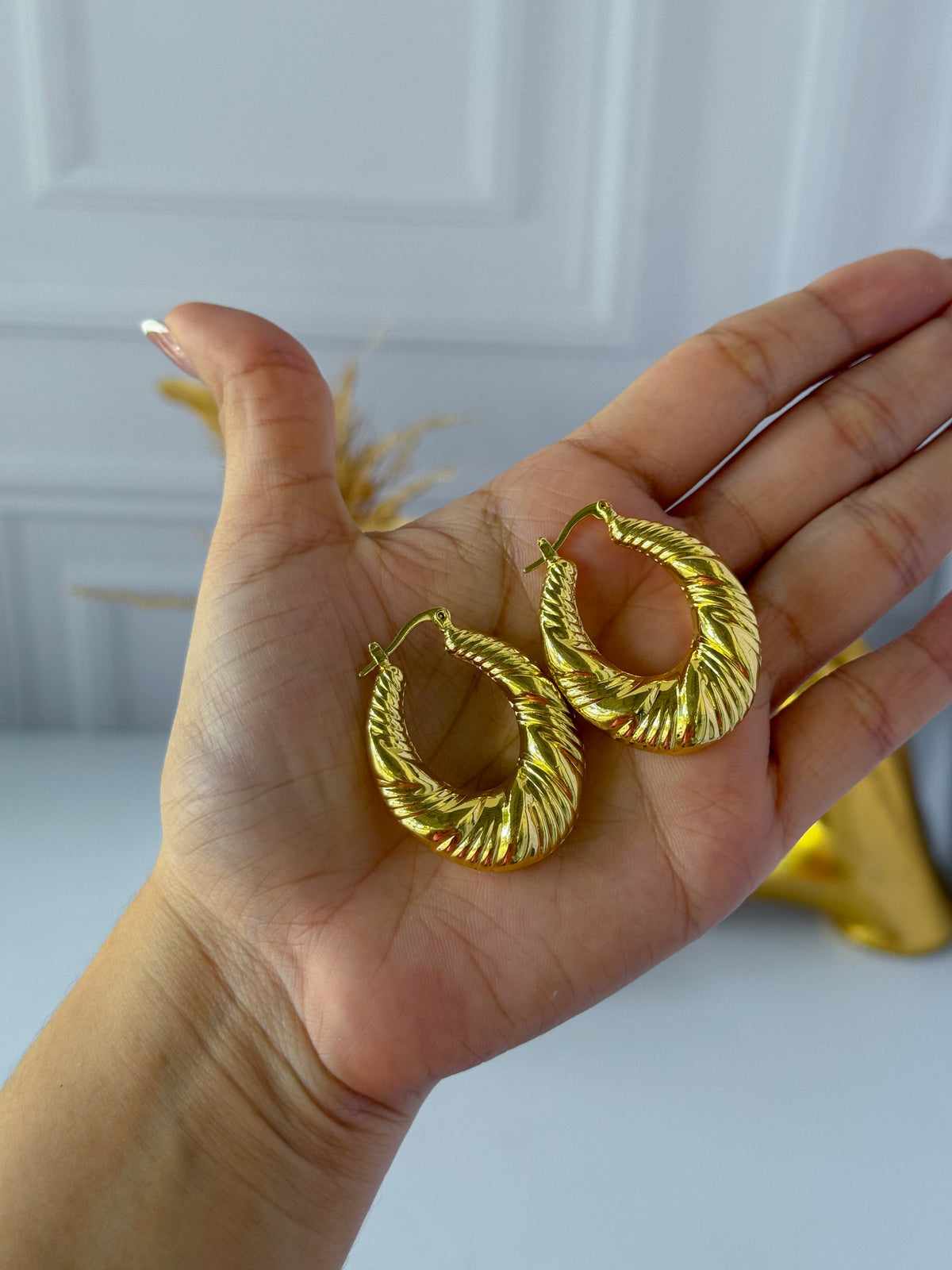 Thick oval hoop earring
