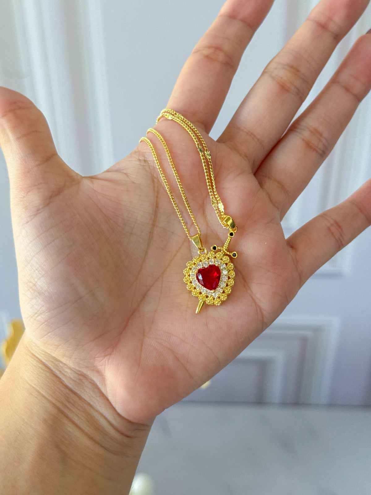 Dúo de cadenas para compartir corazón espada
