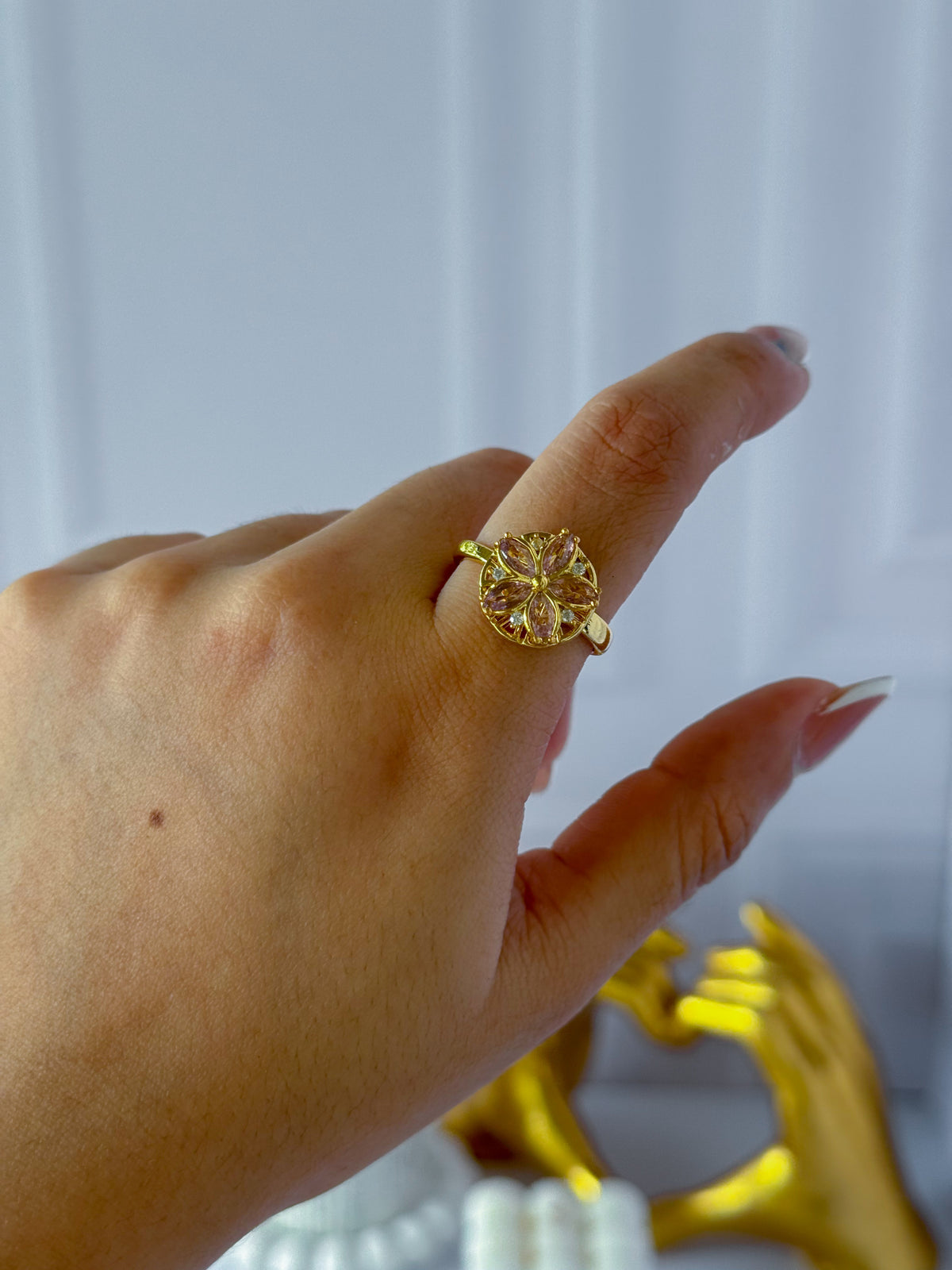 Pink rotating flower ring