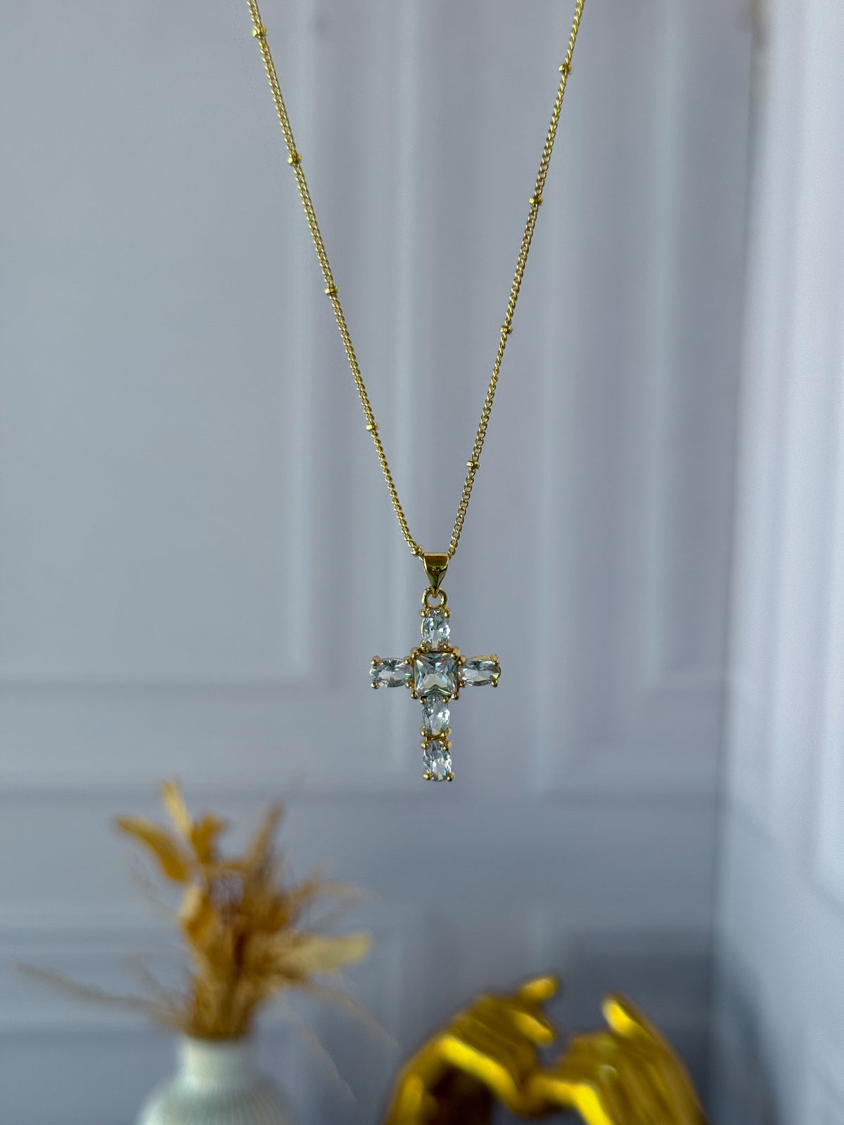 Pearled cross chain