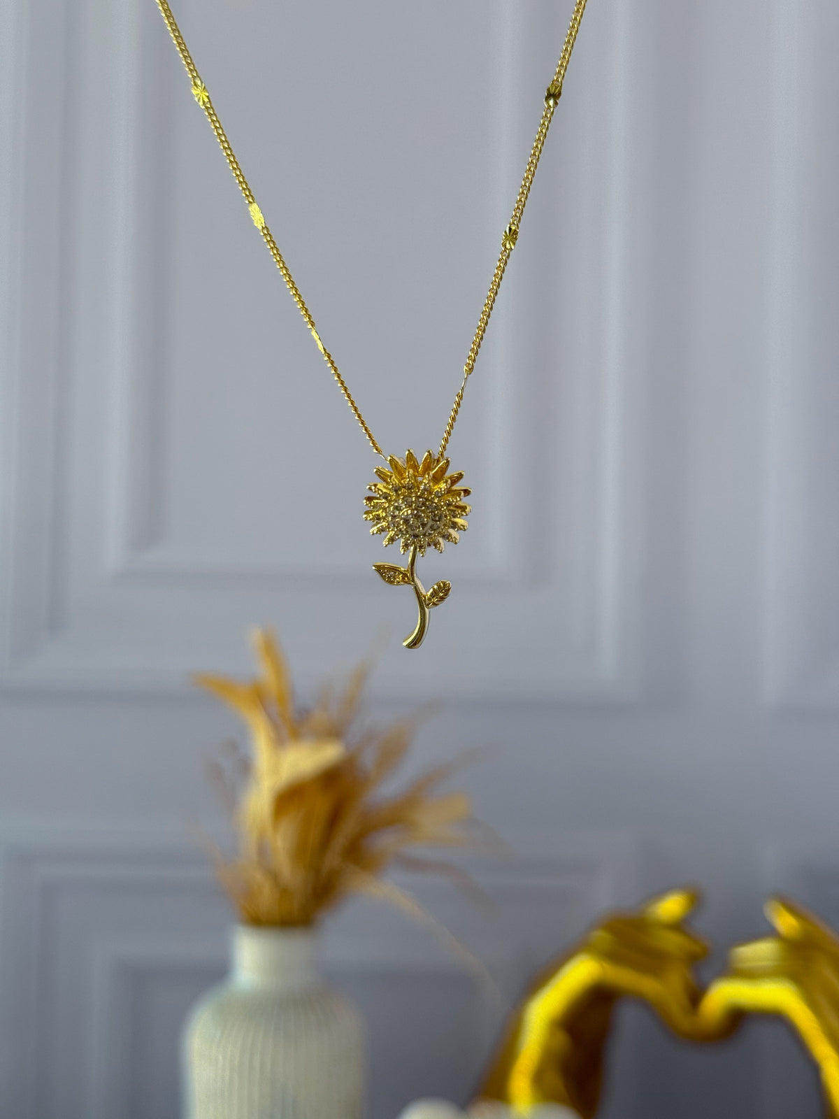 Collar girasol giratorio