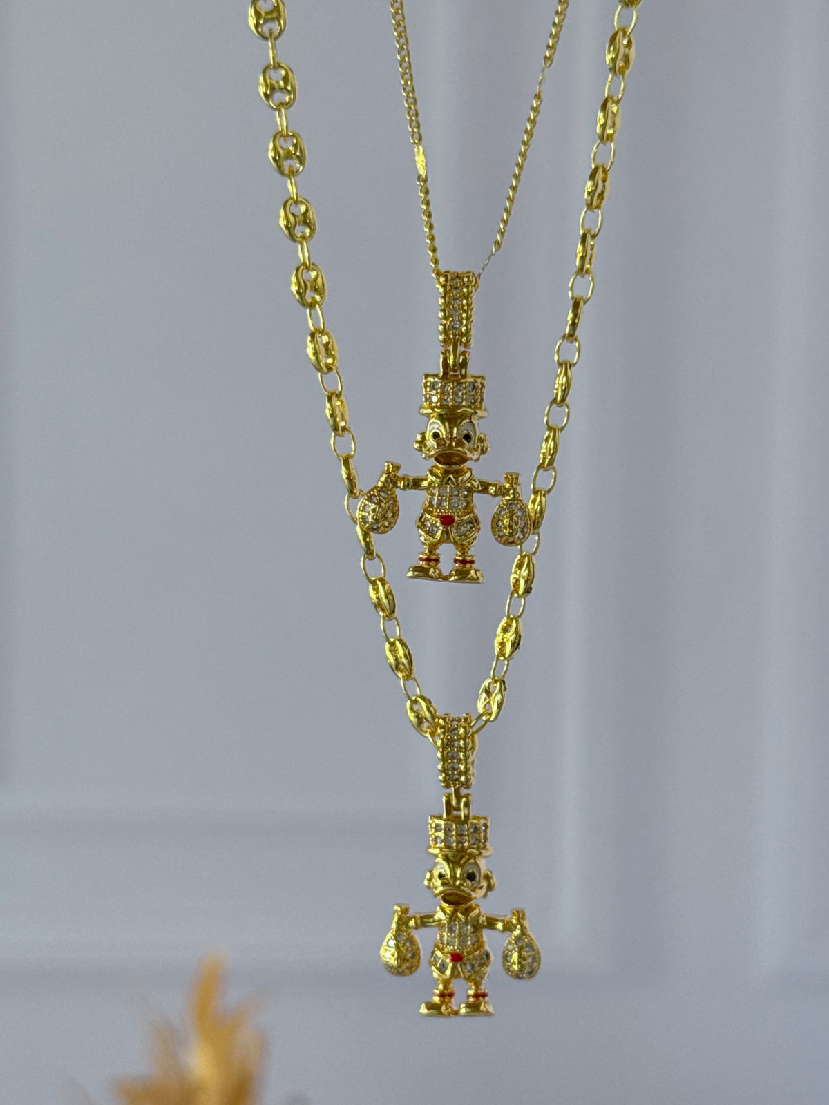 Dúo de cadenas para compartir tío rico