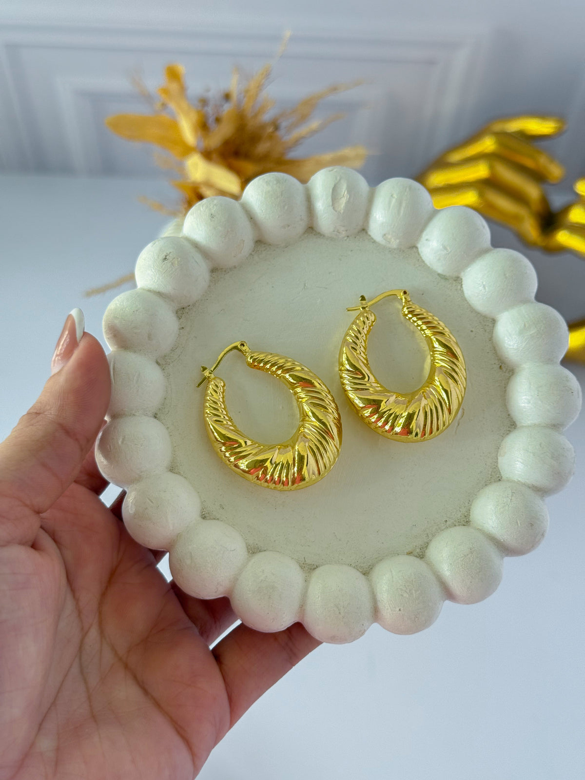 Thick oval hoop earring