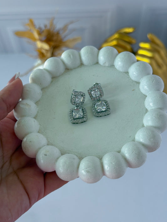 White silver studs