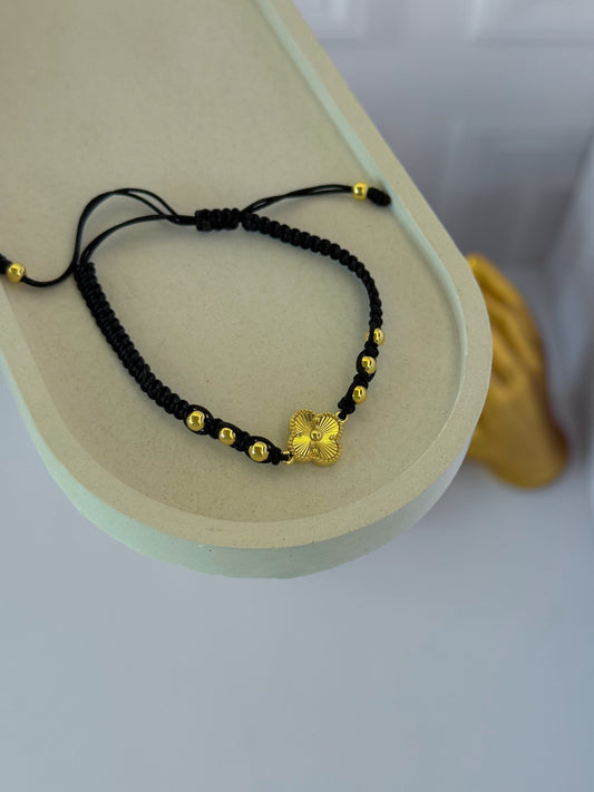 Black woven clover bracelet